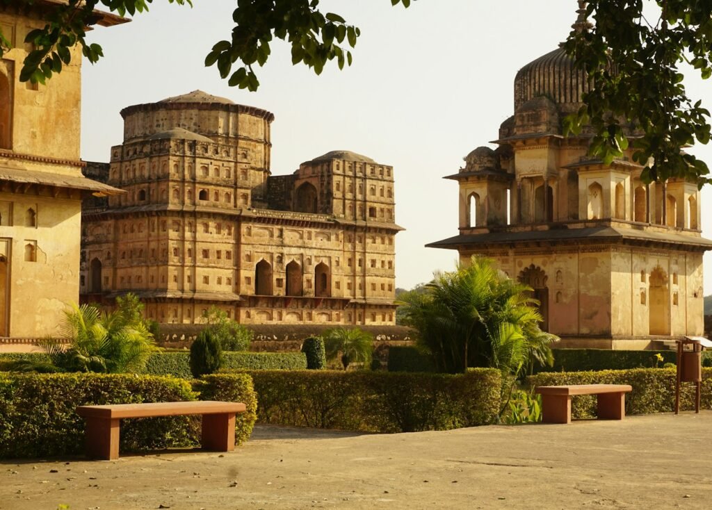 a couple of benches sitting in front of a building